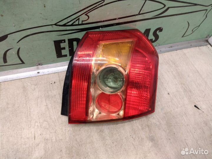 Фонарь задний правый Toyota Corolla E12 / 120