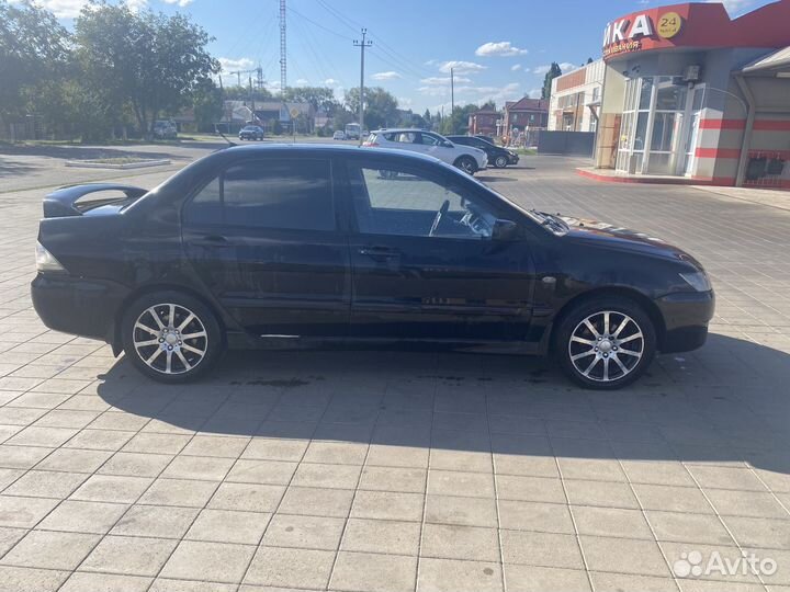 Mitsubishi Lancer 2.0 МТ, 2005, 215 000 км