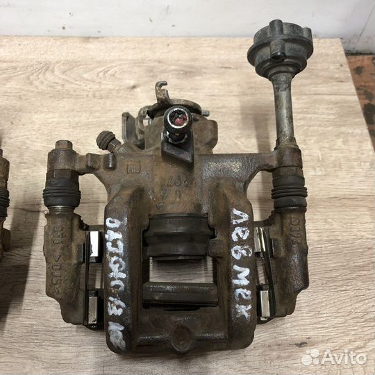 Суппорт задний Opel Astra j Gtc мех ручник