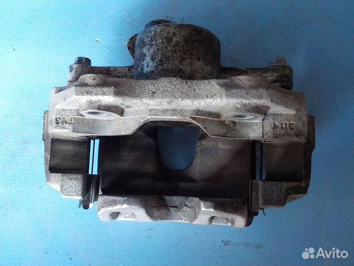 Тормозной суппорт передний левый volkswagen Polo 2