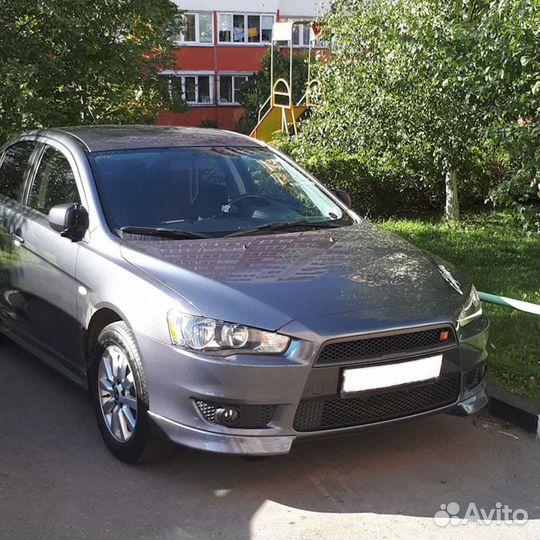 Клыки переднего бампера Митцубиси Лансер 10