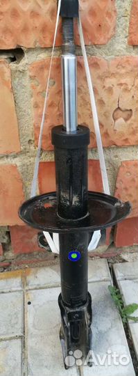 Стойка передняя Renault Duster