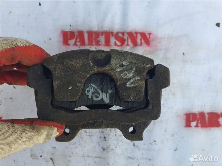 Суппорт задний левый Киа Спортаж