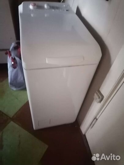 Стиральная машина с вертикальной загрузкой