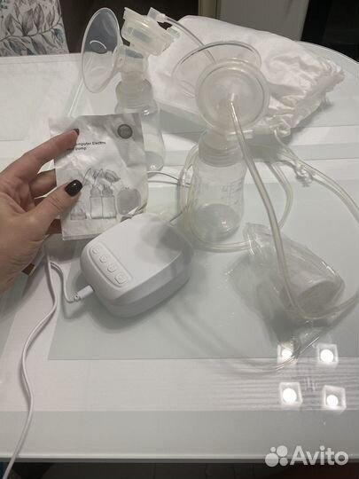 Молокоотсос электрический новый