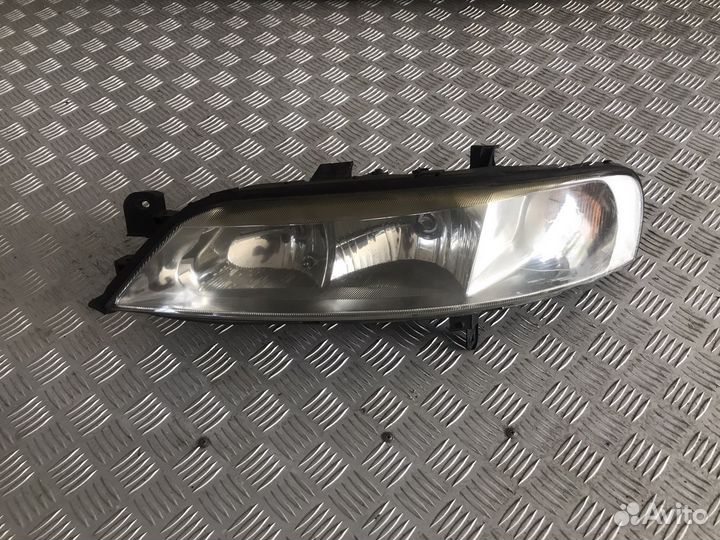 Фара левая Opel Vectra B