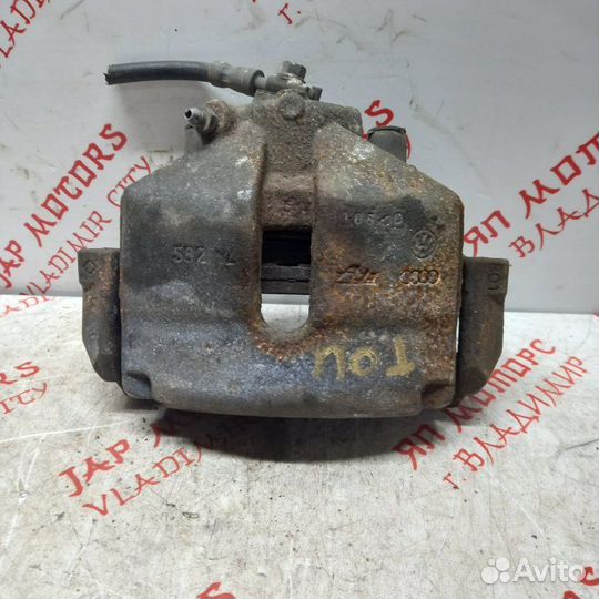 Суппорт тормозной передний правый Volkswagen