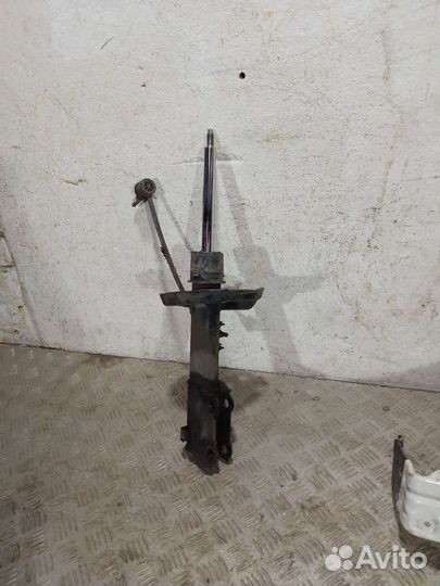 Стойка амортизатора передний левый Kia Cerato 4