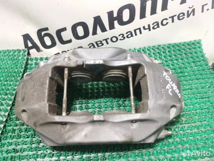 Суппорт тормозной передний левый Volkswagen