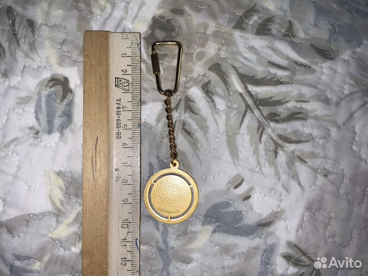 Офиц. брелок Международной Федерации борьбы fila