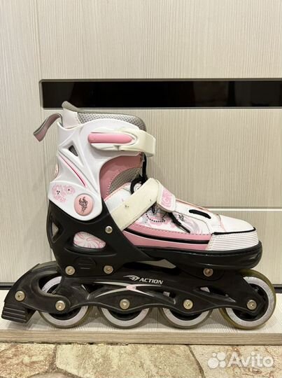 Роликовые коньки