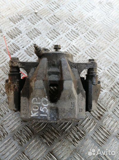 Суппорт передний правый Toyota Corolla E150 1.6