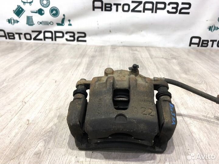 Суппорт тормозной передний левый Kia Rio 3 G4FA