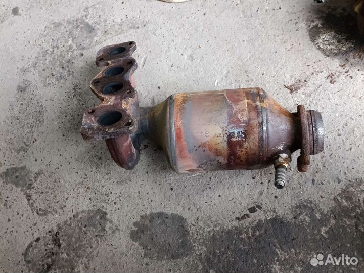Выпускной коллектор renault sandero
