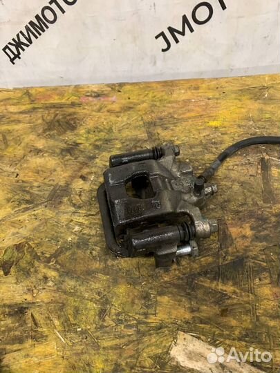 Суппорт задний левый Nissan Teana J32 Теана J32