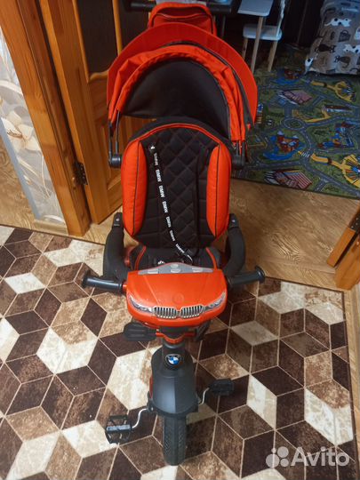 Детский трехколесный велосипед коляска