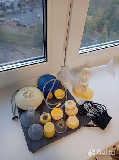 Молокоотсос medela электрический