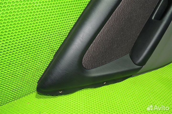 Обшивка двери задняя левая Toyota Caldina AT211