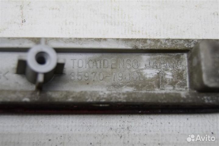 Отражатель в бампер задний левый Сузуки сх4 SX4