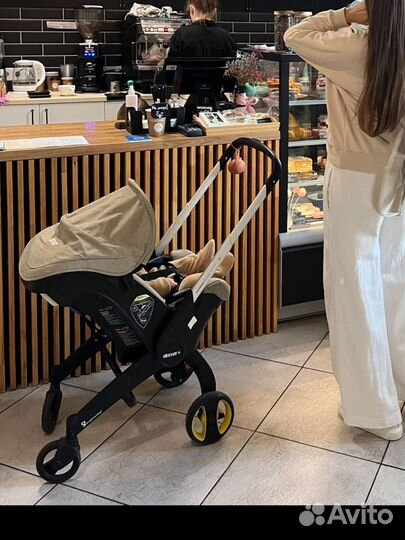 Коляска автокресло doona с базой isofix