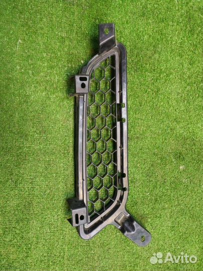 Решетка радиатора передняя левая Mitsubishi Lancer