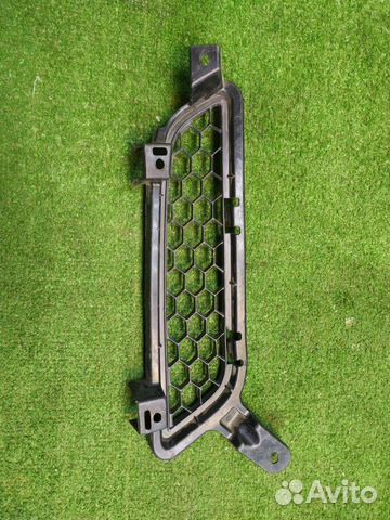 Решетка радиатора передняя левая Mitsubishi Lancer