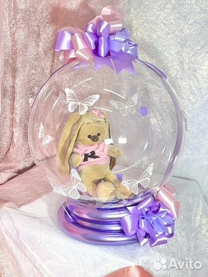 Игрушка в кристальном шаре