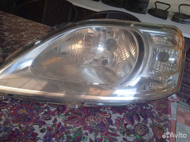 Фара renault logan