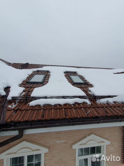 Монтаж греющего кабеля и гирлянд на кровлю и фасад