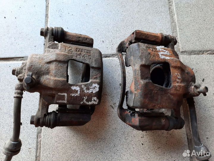 Суппорт передний Chevrolet Aveo T250