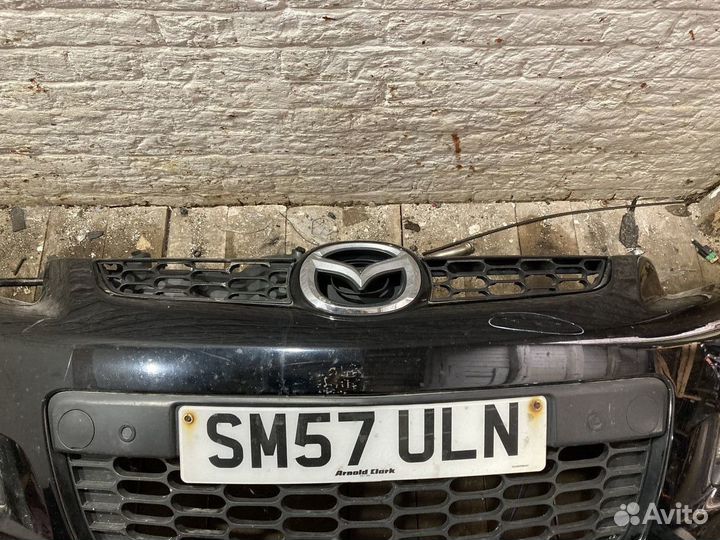 Бампер передний Mazda CX 7 2007-2012