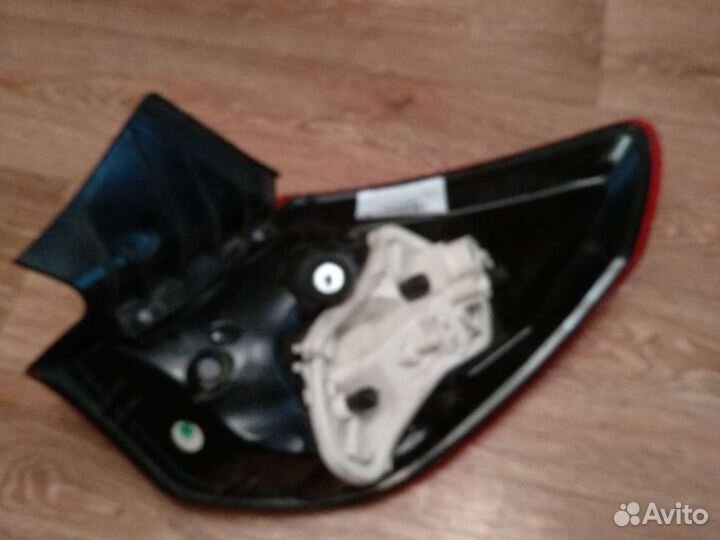 Задний левый фонарь Опель астра j хетчбек