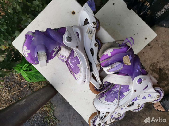 Роликовые коньки