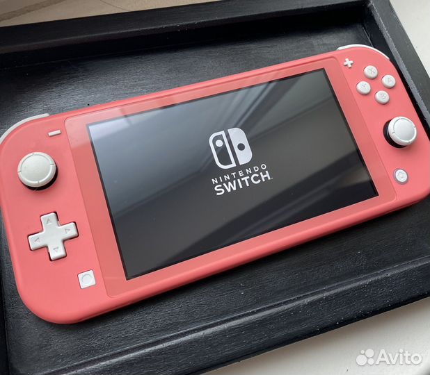 Nintendo Switch Lite / коралловый цвет