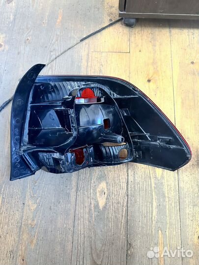 Фонарь на Фольксваген Поло 2011 г
