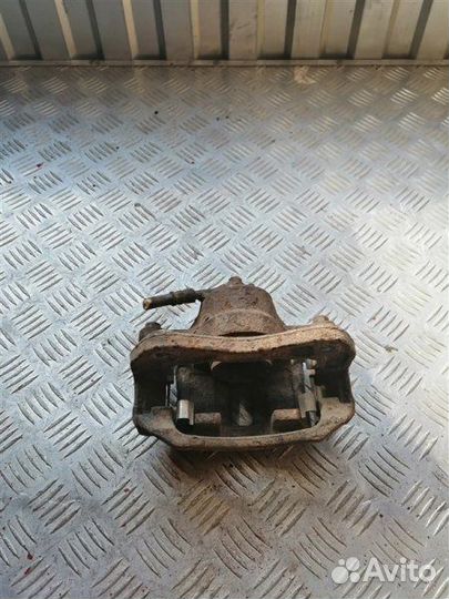 Суппорт тормозной передний левый Kia Rio 2 JB G4EE