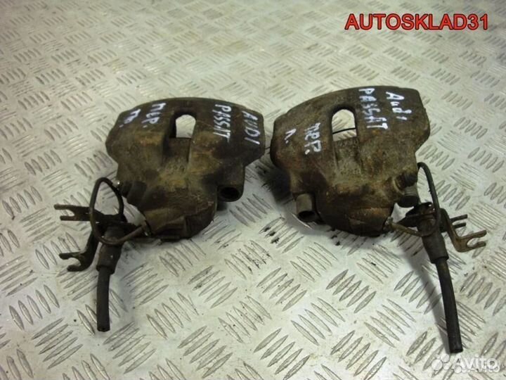 Суппорт тормозной передний VW Passat B5
