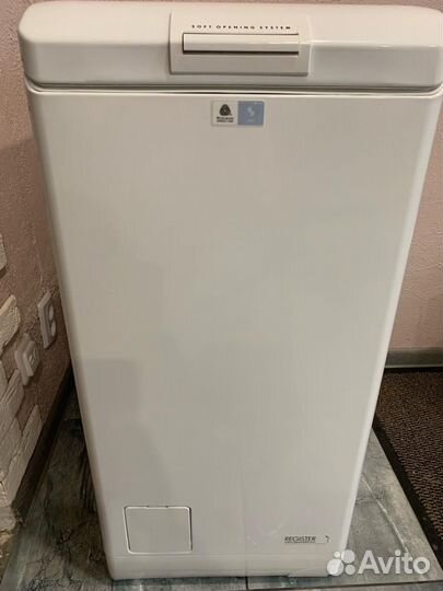 Стиральная машина с вертикальной загрузкой AEG