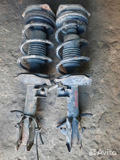 Стойка передняя левая Nissan Tiida C11