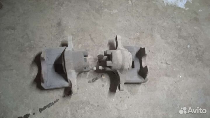 Суппорта передние Mitsubishi lancer 10