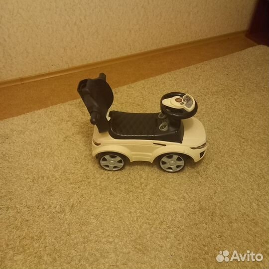 Детская машинка каталка с ручкой б/у