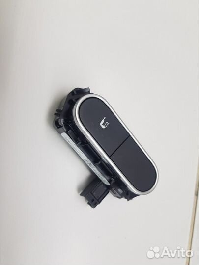 Кнопка обогрева сиденья