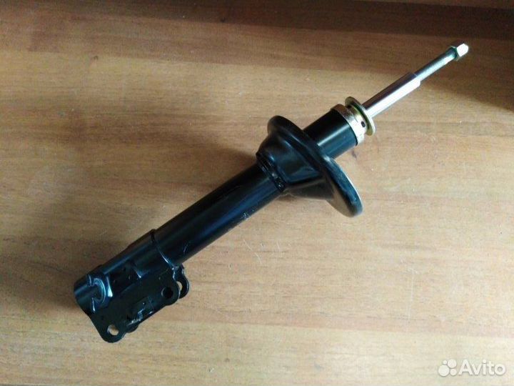 Амортизатор подвески задний левый Mazda 323 1989