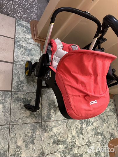 Коляска автокресло doona с базой isofix