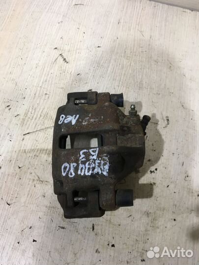 Суппорт тормозной передний левый Ауди 80 Б3 Б4