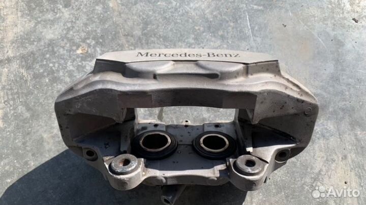 Суппорт тормозной передний левый Mercedes-Benz