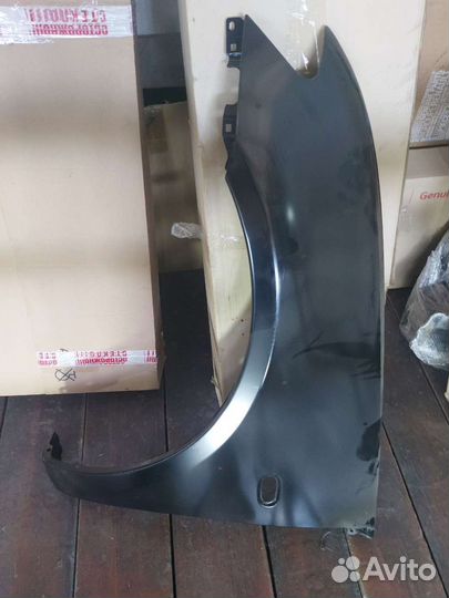 Крыло переднее левое Mitsubishi L200 оригинал