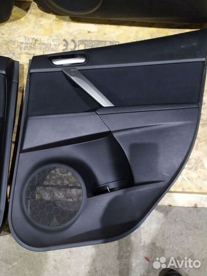 Обшивки дверей Мазда 3 BL