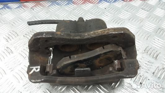 Суппорт тормозной передний левый KIA sorento 1 (MU