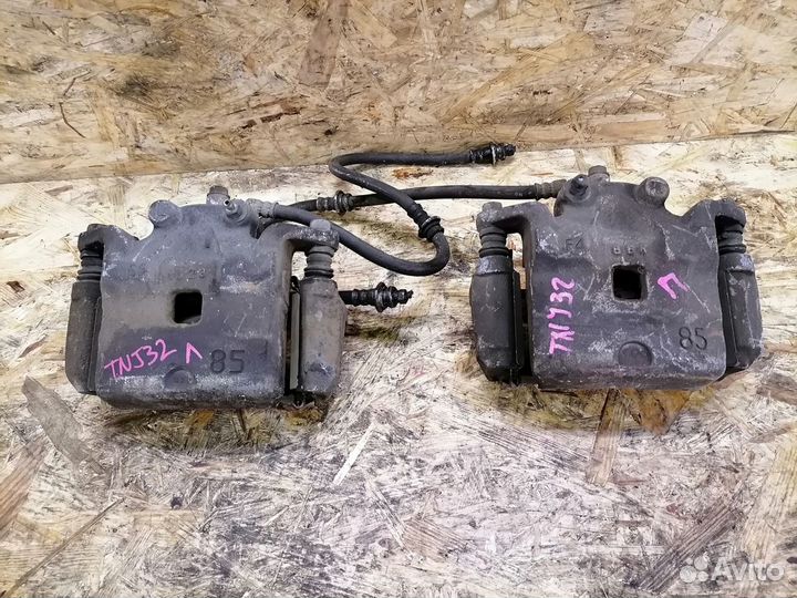 Суппорт тормозной передний Nissan Teana J32 4WD